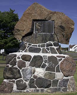 The 1914 memorial to Douglass Houghton is located on M26 just a short distance west of the museum.